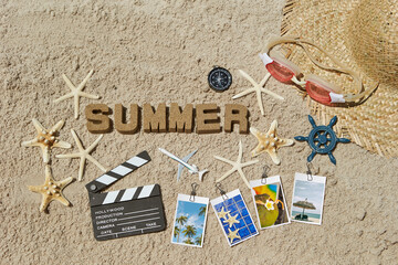 Various summer items on the sea sand