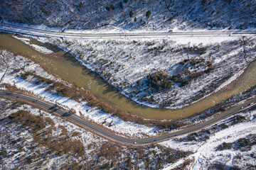 Aerial view on mountain road from drone in