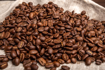 Coffee beans on a dark background. View from above.