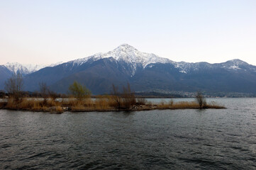 Mountain peak towering on Lake Como, Italy