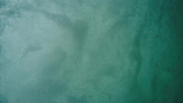 Heavy ocean wave breaks on camera
