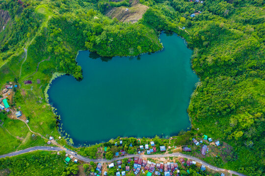 Aerial view of a few cottage along Boga lake in Ruma, Chittagong province, Bangladesh.
