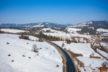 Aerial view on mountain road from drone in
