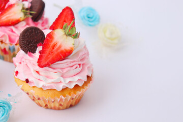 cupcakes with whipped cream and sprinkles