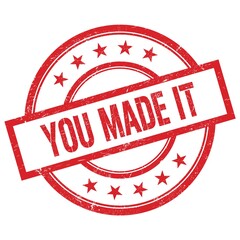 YOU MADE IT text written on red vintage round stamp.