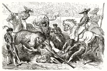 Fototapeten bullfighting violent scene. unseated picador falling down with horse attacked by angry bull. Ancient grey tone etching style art by Dore, Magasin Pittoresque, 1838 © Mannaggia