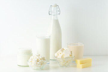 Fototapeta na wymiar Different milk products: milk, cheese and yoghurt