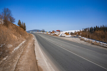 Aerial view on mountain road from drone in