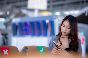 Portrait of Asia women holding passport in the airport