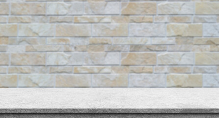 Empty wooden table top with lights bokeh on white brick wall background.