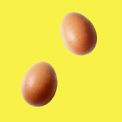 brown egg patter on yellow background
