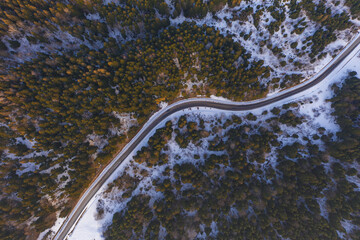 Aerial view on mountain road from drone in