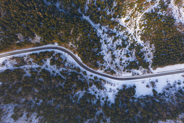 Aerial view on mountain road from drone in