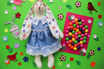 Easter card for children. easter egg made of multicolored candies and place for text 