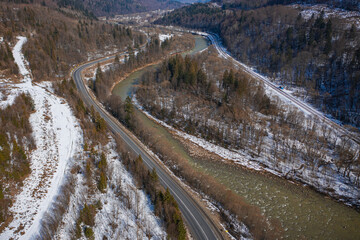 Aerial view on mountain road from drone in