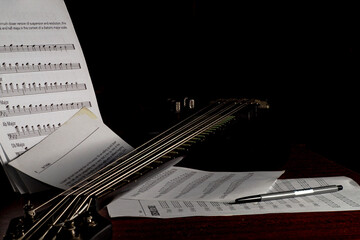  bass guitar on black background,