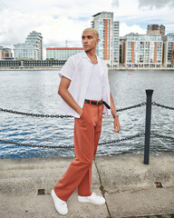 male fashion model posing in city