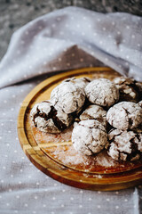  a plate of cakes, only from the oven, sprinkled with powdered sugar