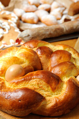 Easter breakfast typical of the Abruzzo region in Italy with Easter pizza eggs salami sweet cheese called pupa and bocconotti typical Abruzzo dessert