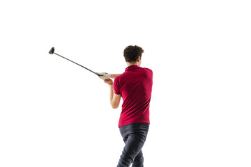 Golf player in a red shirt taking a swing isolated on white studio background with copyspace. Professional player practicing confident, emotions and facial expression. Sport, motion, action concept.