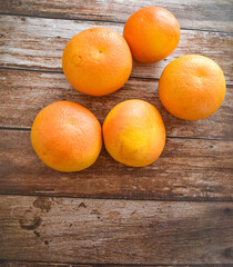 Grapefruits on wooden table