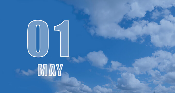 may 01. 01th day of the month, calendar date. White numbers against a blue sky with clouds. Copy space, Spring month, day of the year concept