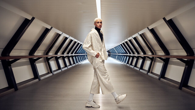 male fashion model posing in tunnel