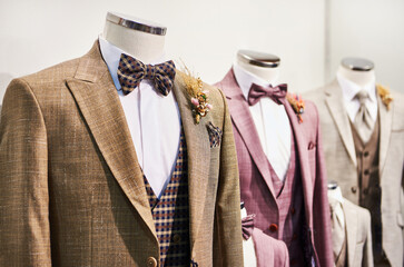 Men's tuxedo with shirts and ties in store