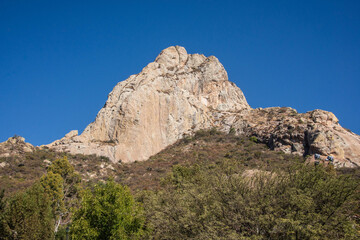 View of the massive Peña de Bernal, UNESCO site and one of the world’s largest monoliths, Queretaro, Mexico