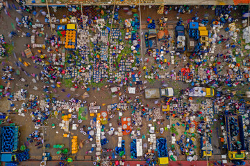 Aerial view of people working and trading at Rahman fish market along Karnaphuli river, Chittagong, Bangladesh.