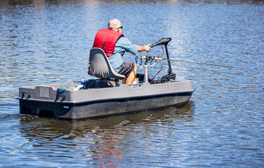 man on small fishing boat