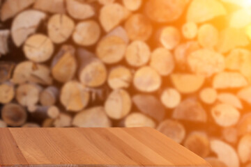 Background of a trunk and a worn old wooden table. Blurred background with old wooden trunks. 