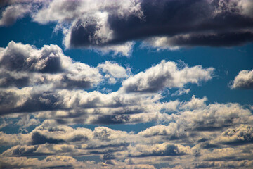 Beautiful blue sky and white cirrus clouds. Background. Texture. Scenery. Material for design.