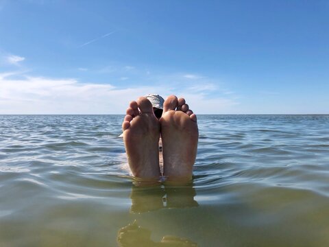 Man floating in the sea, Fanoe, Jutland, Denmark