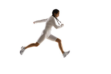 Fototapeta na wymiar Running. Young caucasian female model in action, motion isolated on white background with copyspace. Concept of sport, movement, energy and dynamic, healthy lifestyle. Training, practicing.