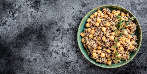 Healthy vegetable lunch from the Buddha bowl with quinoa and chickpeas. healthy food dish for vegetarians. banner format, top view