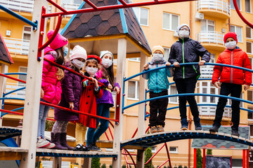 The friends meet on the playground during a pandemic