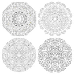 Hand drawn zentangle set of 4 mandalas for coloring page.