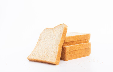 Fresh homemade sliced wheat bread isolated on white background.