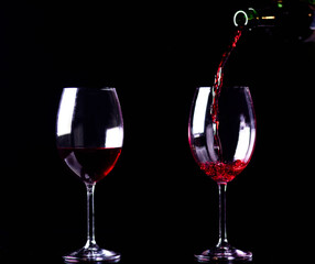 wine glass, bottle, black background