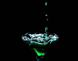 Splash drink cocktail,  black background 