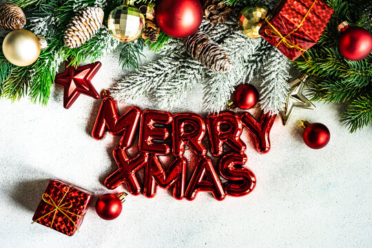 Merry Xmas and Christmas decorations on white background