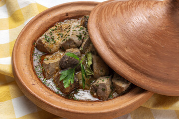 Traditional homemade fish tajin stew with potatoes