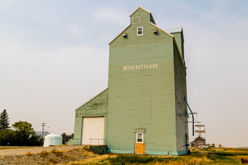 Old green grain elevator by the tracks. Wrenham, alberta, Canada © David
