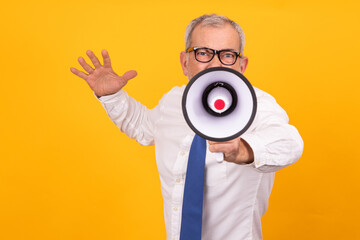 isolated businessman shouting into megaphone