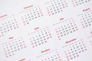 Close up calendar page dates and month background business planning appointment meeting concept