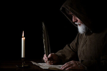 Monk in the Middle Ages writes a letter