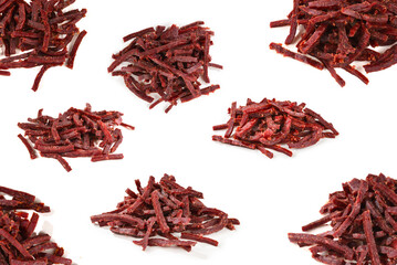 Jerky beef stick isolated on white.