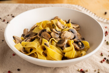 Tagliatelle with mushrooms, typical italian food