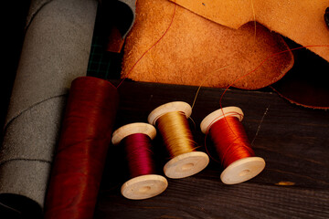 Polyester threads for hand sewing leather goods. Leather and leather products. Sewing tools.